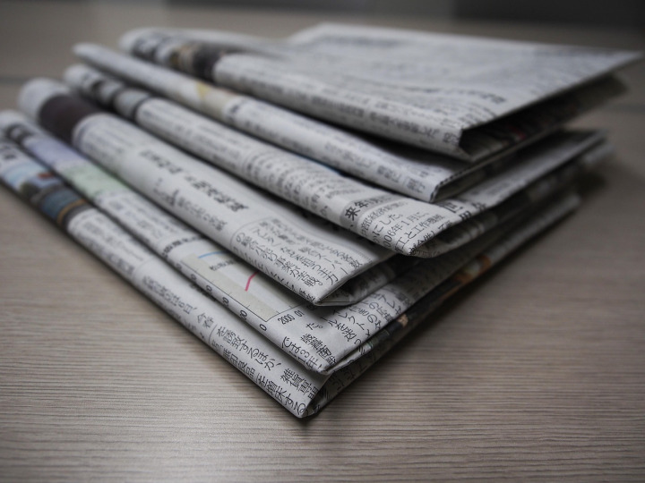 Editorial desk with newspaper